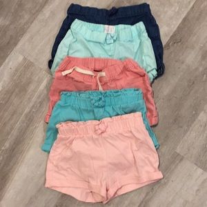 Set of 5 shorts from Gap and Carters.Sizes 4/4T.